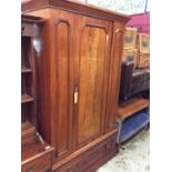 Victorian mahogany wardrobe enclosed by panelled door with draw below