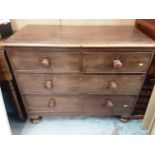 Victorian mahogany chest of two short and two long drawers with bun handles on turned feet