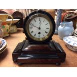 Mantel clock in ebony and walnut case