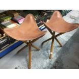 Pair of Norris folding stools with leather seats
