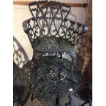 Cast iron garden table with four chairs