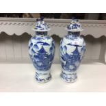 Large pair of late 19th century Chinese blue and white porcelain baluster vases and covers, painted