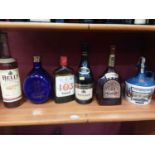Six bottles of alcohol - Bell's Whisky, Dimple Whisky, Bobadilla Brandy, Napoleon French Brandy, E&J