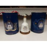 Three bottles of Bell's Royal Commemorative whisky in Wade decanters