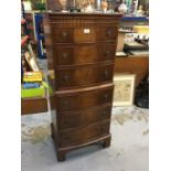 Reproduction mahogany bow front chest of six drawers with ring handles