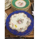 Seventeen Victorian porcelain dessert plates with polychrome painted floral decoration on green grou