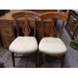Set of four dining chairs, upholstered in G.P & J Barker fabric