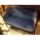 Edwardian mahogany framed bowed settee with blue velvet upholstery
