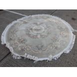 Large circular Chinese rug with floral decoration, 239cm diameter