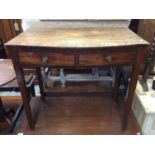 George III mahogany bow front side table with crossbanded top and two drawers on square taper legs