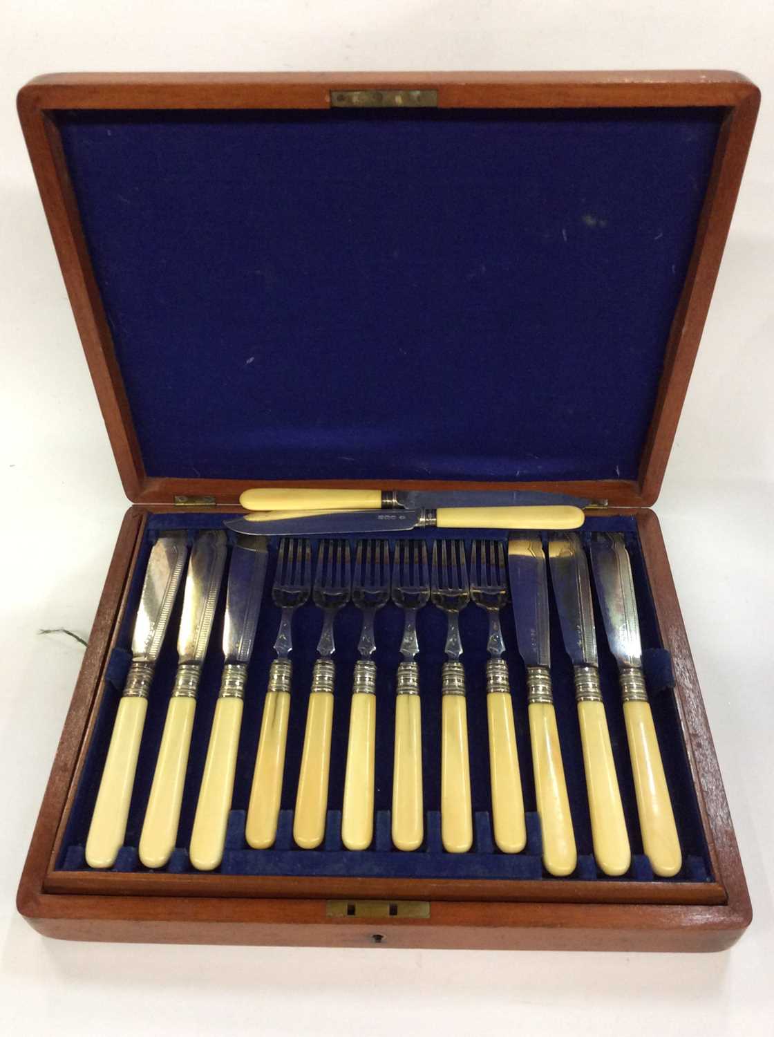 Silver plated fish knives and forks in fitted case, together with two silver fish knives