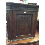 19th century oak hanging corner cupboard, together with another smaller