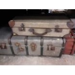 Vintage canvas and brown leather suit case, vintage cabin trunk and one other vintage case