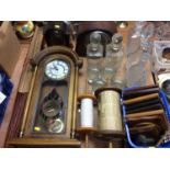 Wall clock, two mantle clocks, glass decanters and other items