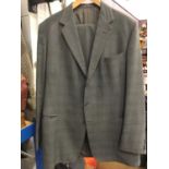 1930s double-breasted long black coat, tailor made two piece Prince of Wales check suit and a Harris