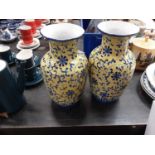 Pair of Yellow glazed Chinese Vases with drilled based