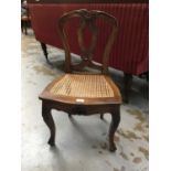 Antique Continental beech low chair with cane seat