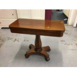 Regency mahogany pedestal tea table with fold-over revolving top