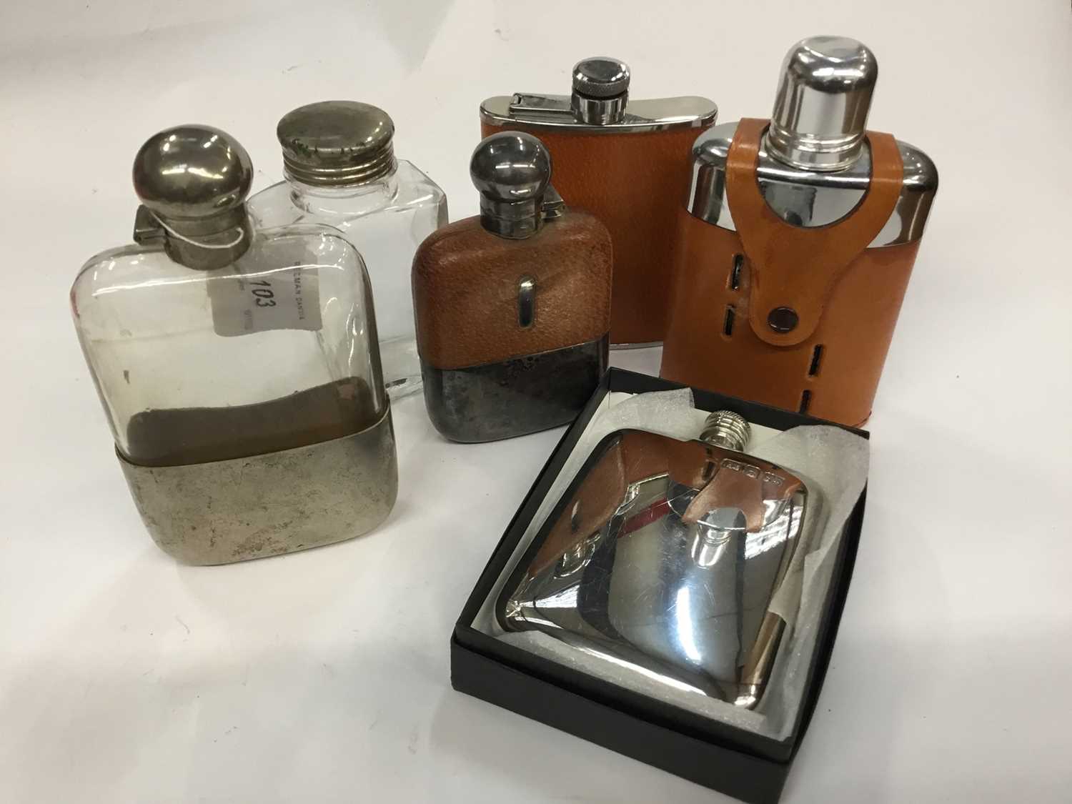 Six assorted hipflasks