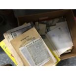 Five boxes of assorted ephemera to include commemorative newspapers, stamps, books, The Wide World m