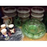 Nine glass light shades, green glassware, glug jug, three character jugs etc