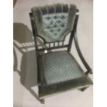 Victorian ebonised nursing chair