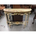 Decorative painted console table with onyx top and carved floral frieze on reeded legs 116 cm wide,