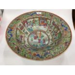 19th century Cantonese famille rose basin decorated with panels depicting figures, riveted, 42cm dia