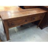 Early 19th century elm dresser base with two drawers with tuned bun handles on plain legs