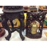 Eastern carved hardwood gong with brass bell and carved hard wood jardiniere stand