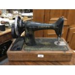 Two vintage Singer sewing machines