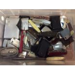 Group penknives, lighters, military badges, coins and sundries