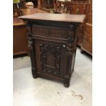 Late Victorian carved oak cupboard