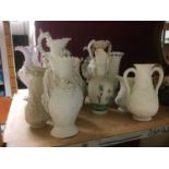Collection of Victorian white glazed Parian ware jugs, by Minton and others, with applied and moulde