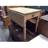 Victorian pine drop lead table with end draw