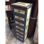 Narrow tall chest of seven drawers with painted decoration