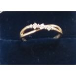 9 CT Gold Ladies Crossover Style Ring , 10 Diamonds 0,10 CT Size O