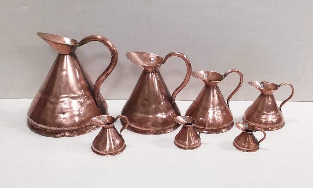 Set of 7 Vict Copper Jugs