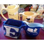 Four various pub water jugs including Wade Worthingtons E example
