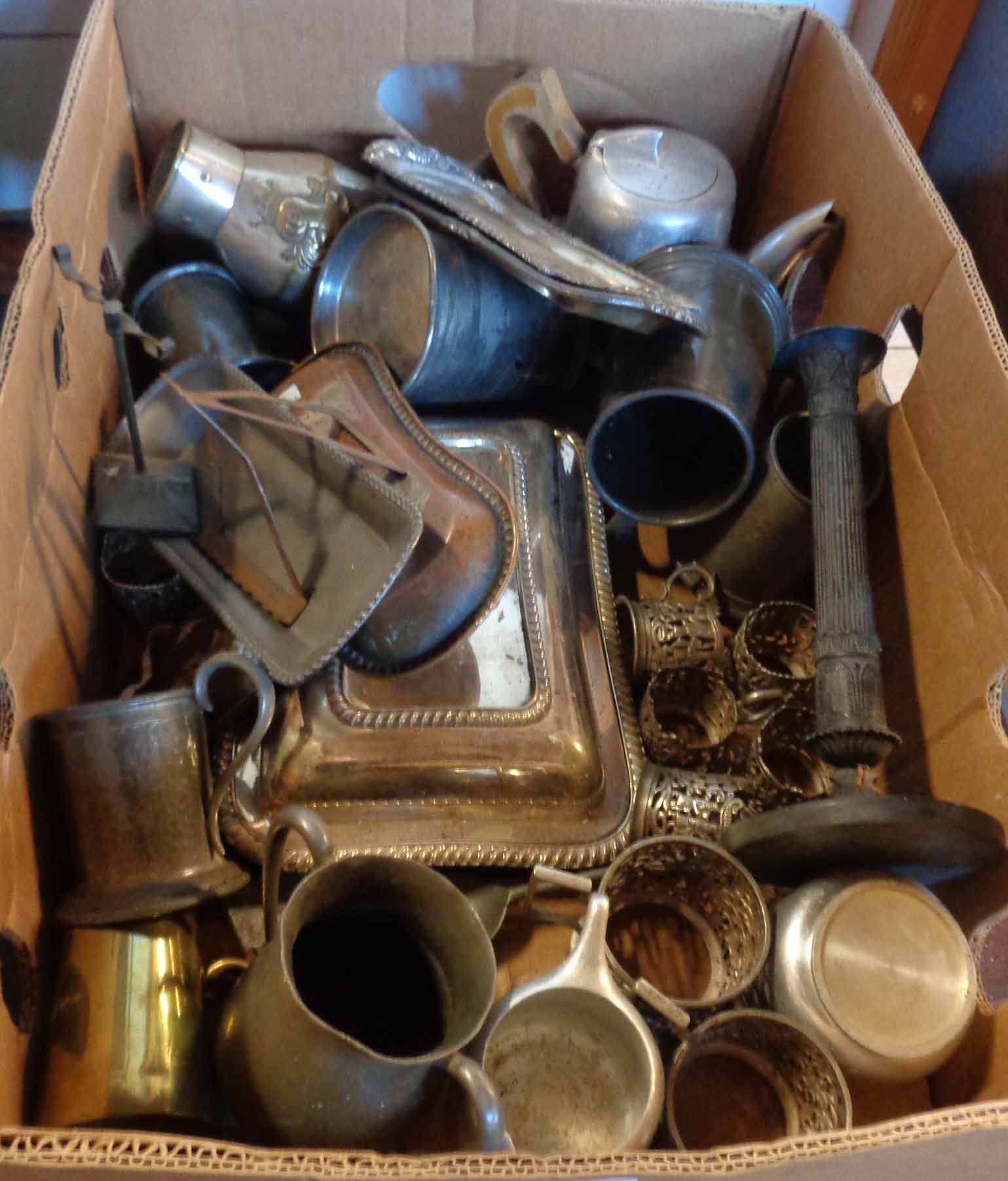 A box containing metalware and silver plated items