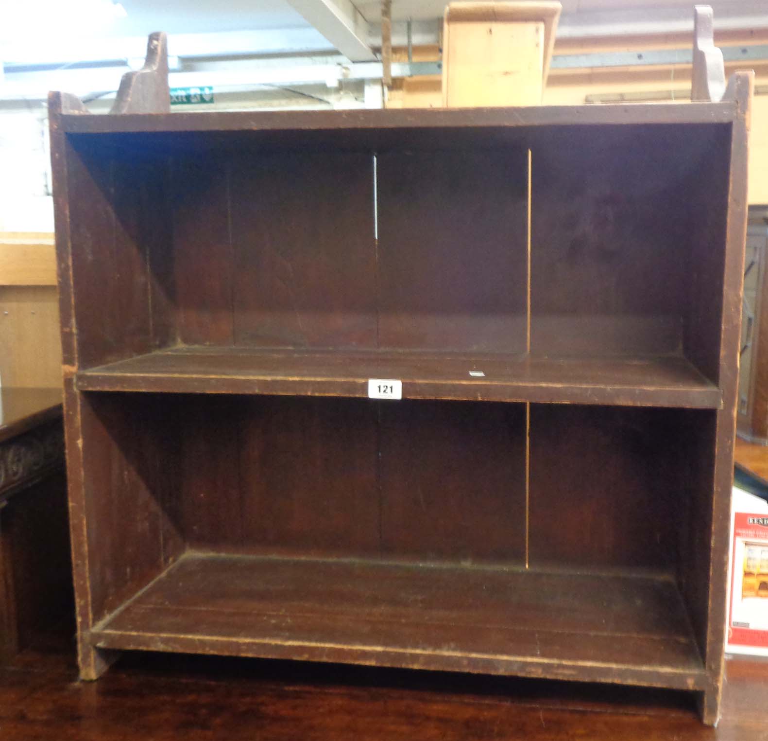 A 31" old stained pine wall mounted two shelf unit with bracketed supports