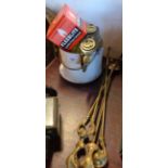 A brass companion set with claw and ball terminals - sold with enamelled items including a pail,