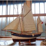 A restored wooden kit display model of a French tuna fishing boat 'Marie Jeanne'