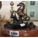 A modern reproduction bronzed horse pen stand on composite marble plinth