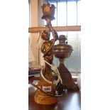 A metal figural table lamp - sold with an oil lamp base
