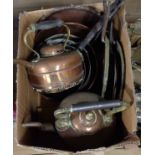 Three copper saucepans with lids and two kettles, etc.