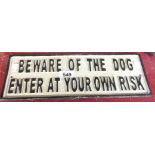 A reproduction painted cast iron "Beware of the Dog" sign