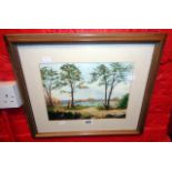 V.M.W.: a framed watercolour, depicting a beach scene with trees and rocks - signed