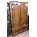 A 3' 11" Victorian mahogany double wardrobe with reduced cornice, material lined hanging space