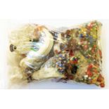 A bag containing a quantity of loose hardstone, glass and other good quality jewellery beads